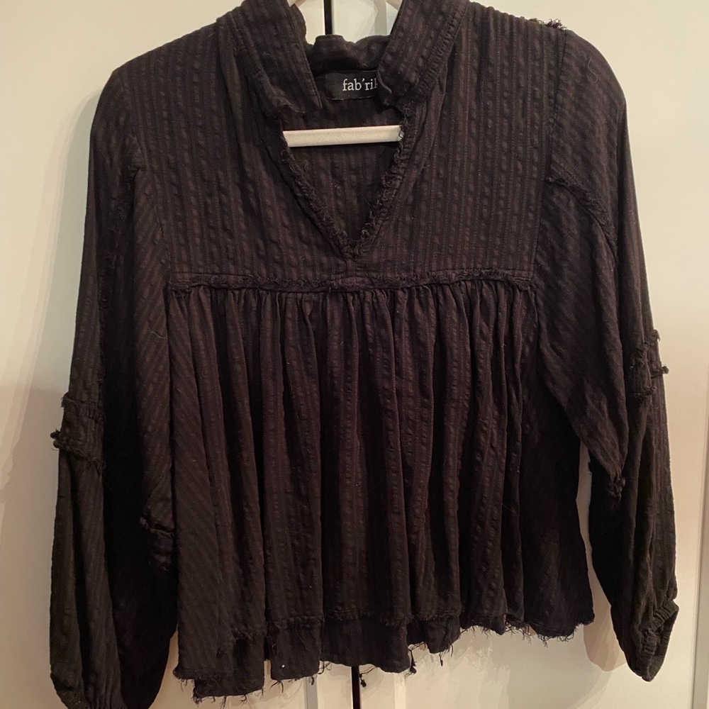 Black babydoll blouse with fringe